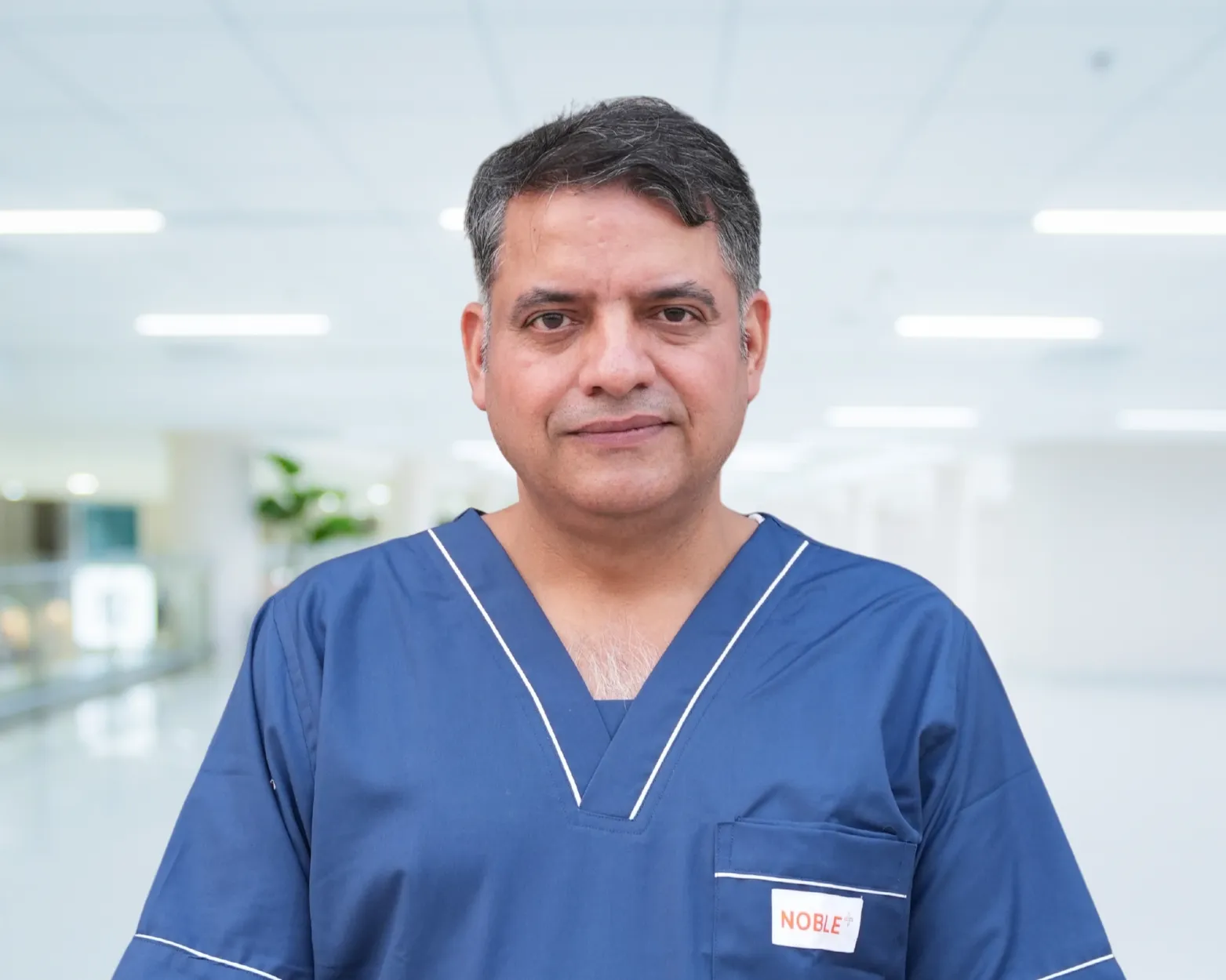 Dr Vinod Malik